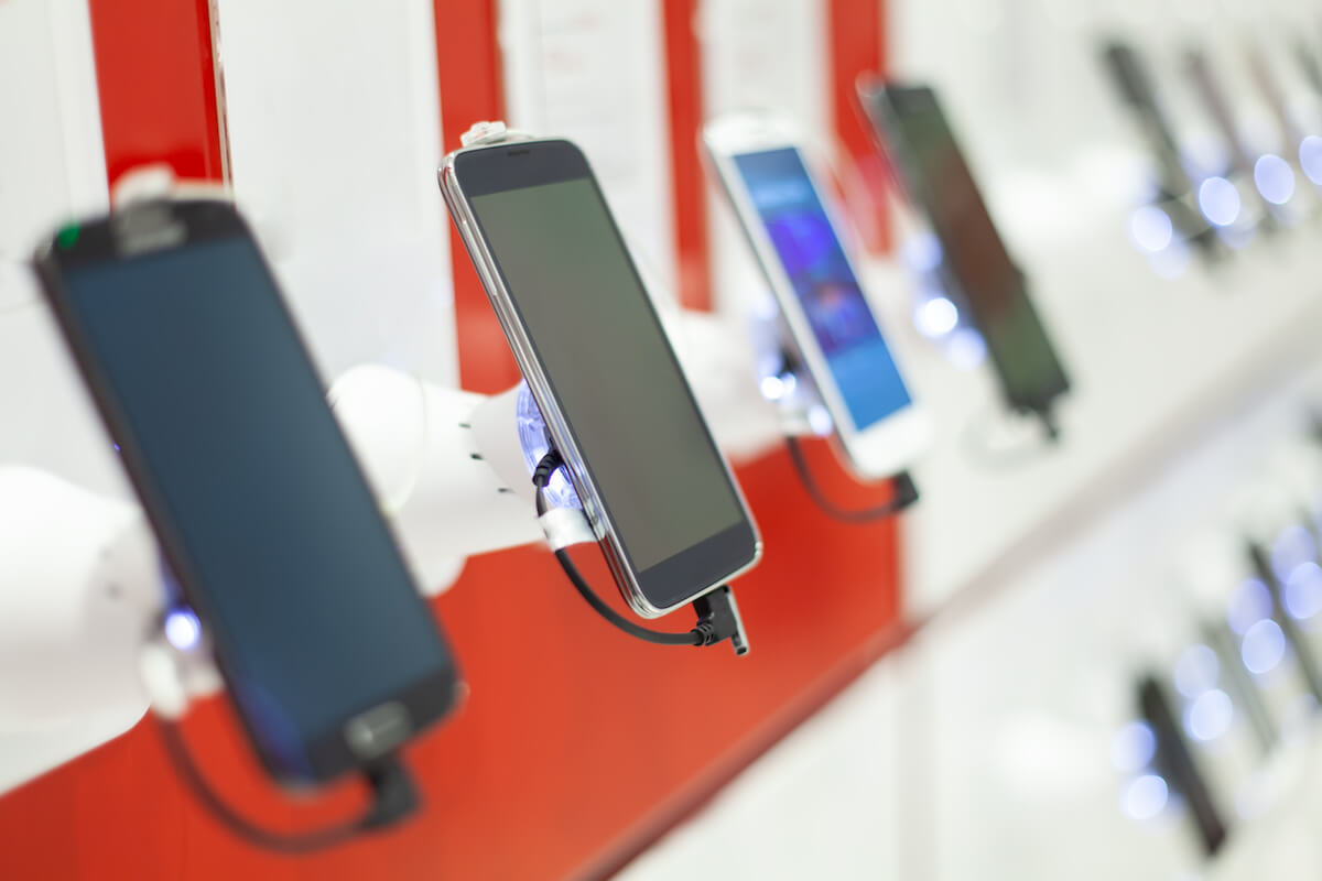 Phones charging in a store